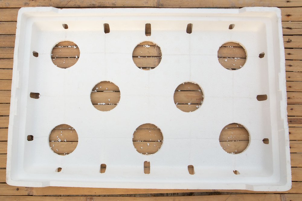 Upper half of grow box with holes properly aligned.