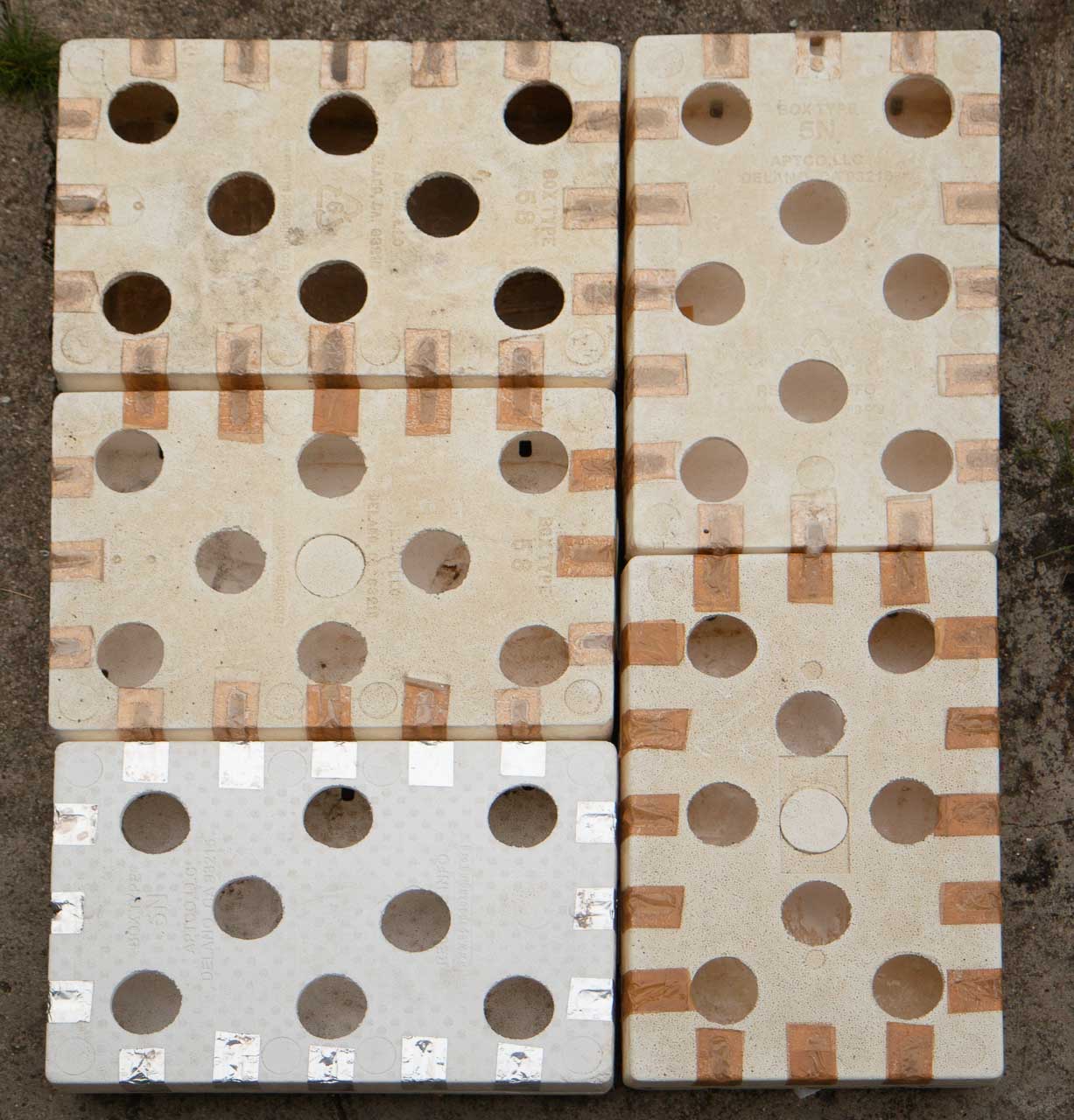Five styroboxes arranged so that they fit in a 1m⨉1.2m area.